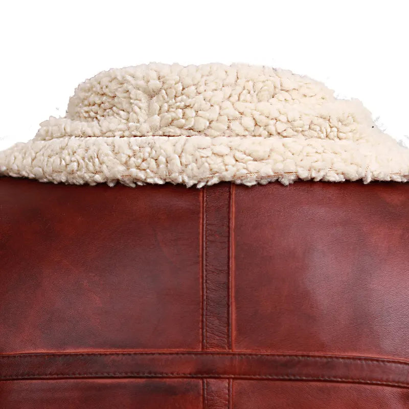 Close-up of shearling stand collar on brown oak leather jacket
