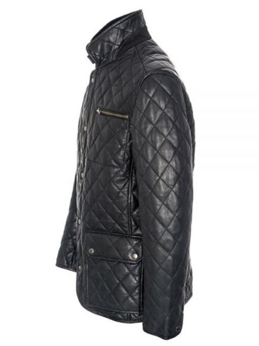 Close-up of the quilted shoulder and sleeve detail on the black leather jacket.
