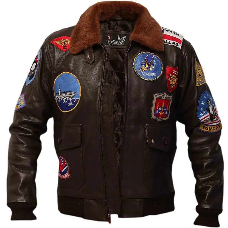 Brown leather jacket with various patches on a white background